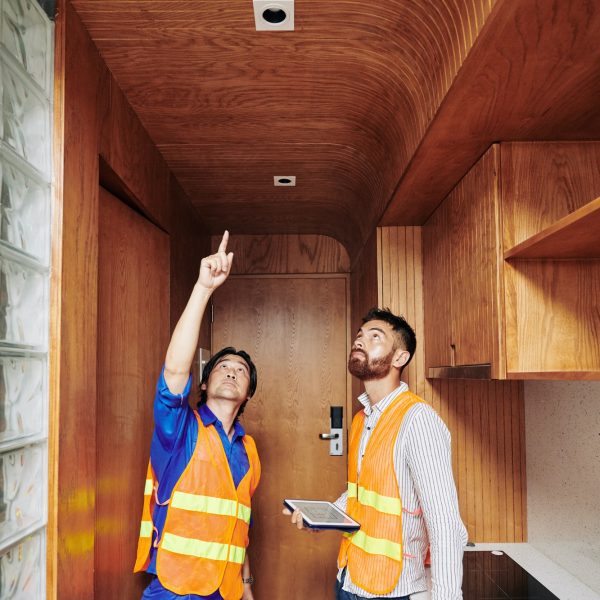 Electrician showing light sockets